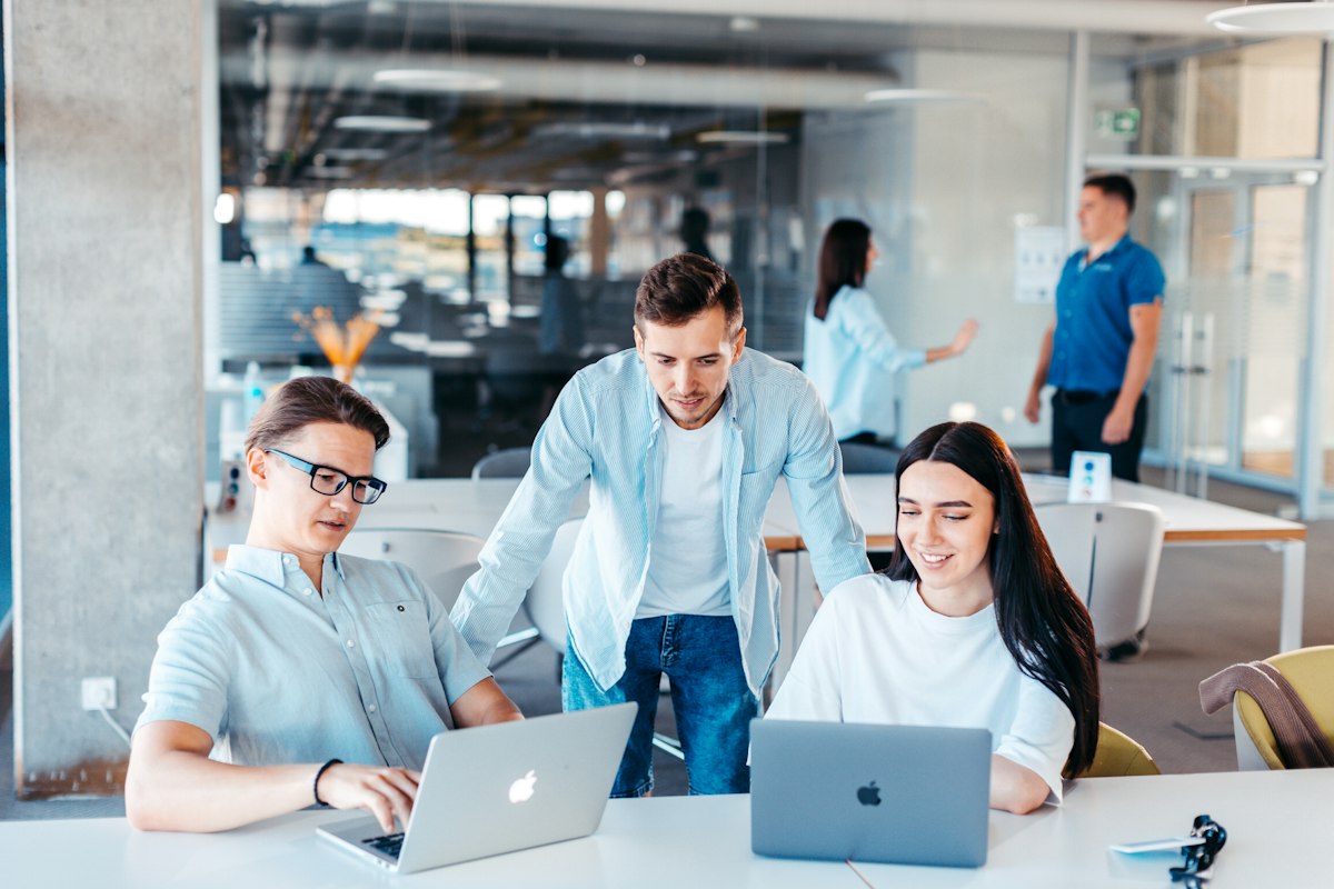 HCN Global team collaborating together, reflecting our core values of integrity, excellence, and collaboration